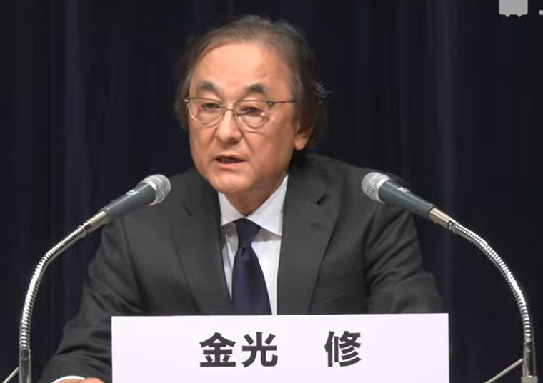 記者会見の金光治